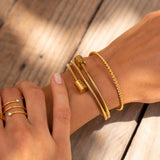 Pulsera de oro retorcida