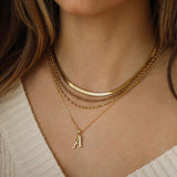 Collar con colgante de serpiente brillante